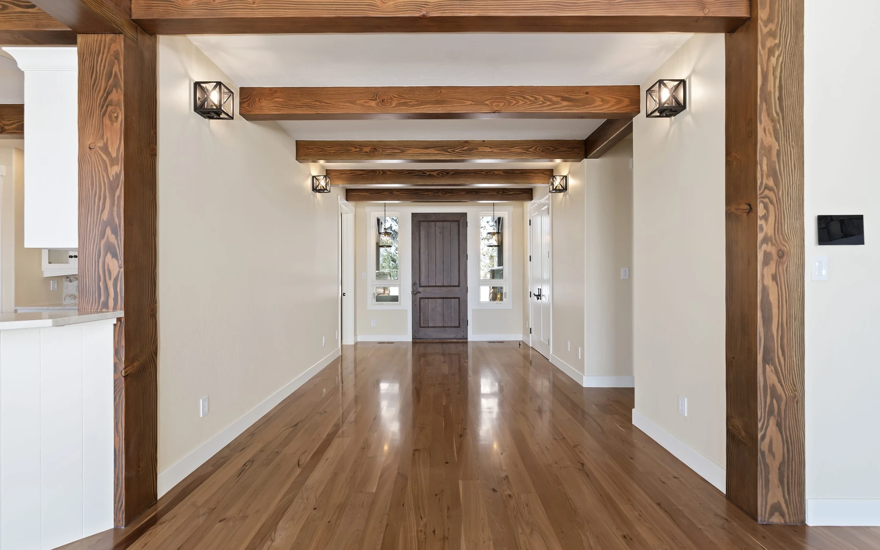 Interior detail in the Club Hill Refresh remodel at Whitetail Club, showing built-in cabinetry and wood finishes.