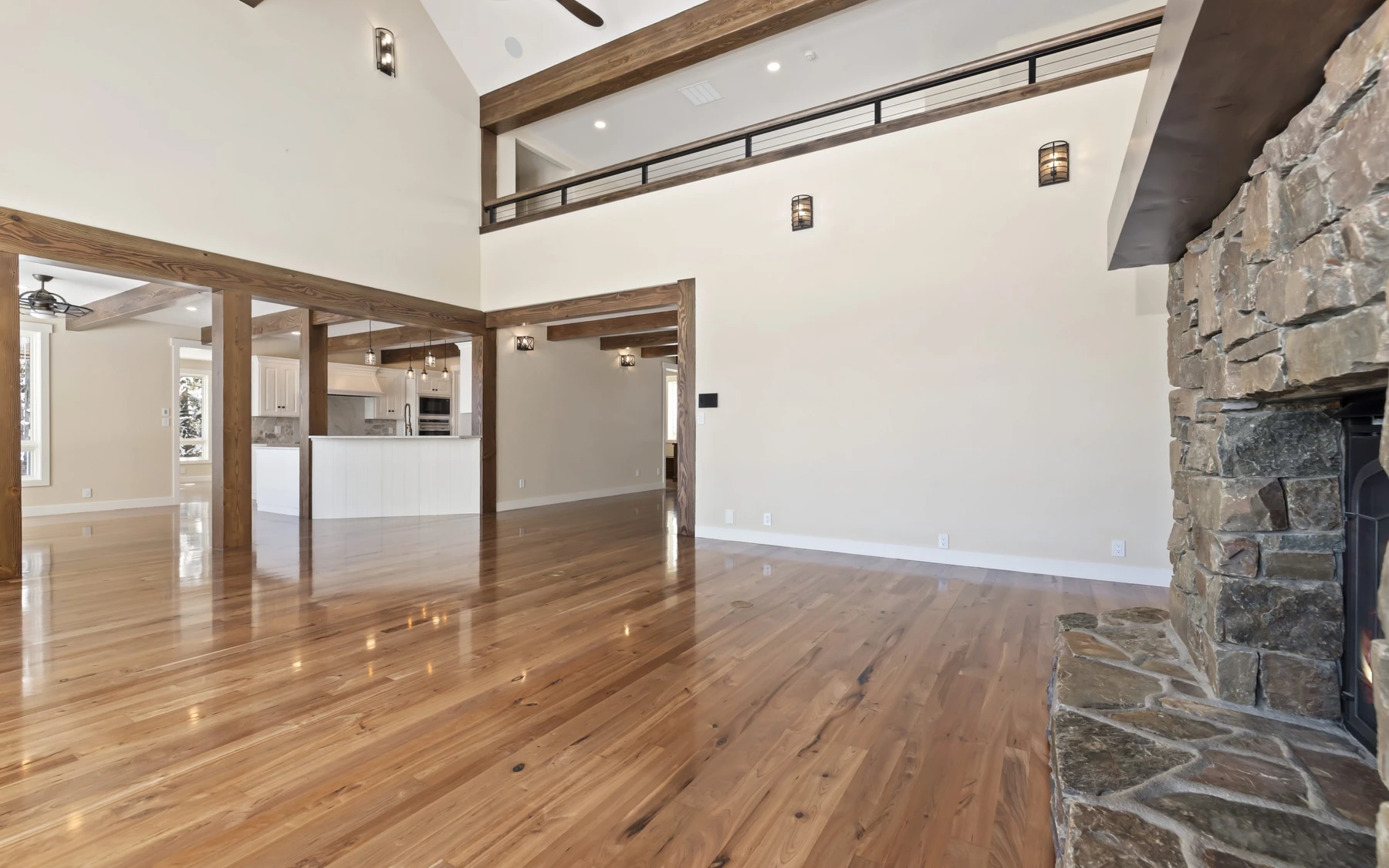 Interior detail in the Club Hill Refresh remodel at Whitetail Club, showing wood finishes and stone details.