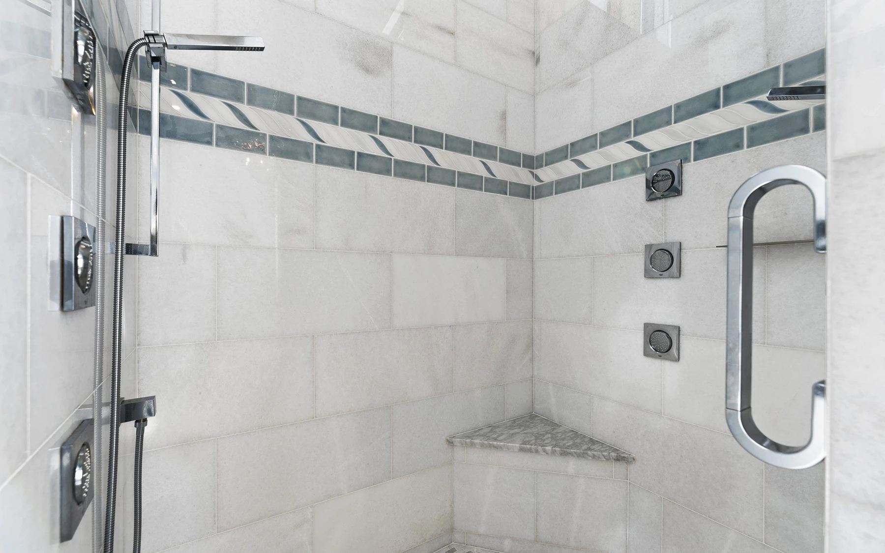Bathroom in the Contemporary Hideaway custom home near McCall, with a glass shower and a custom vanity.