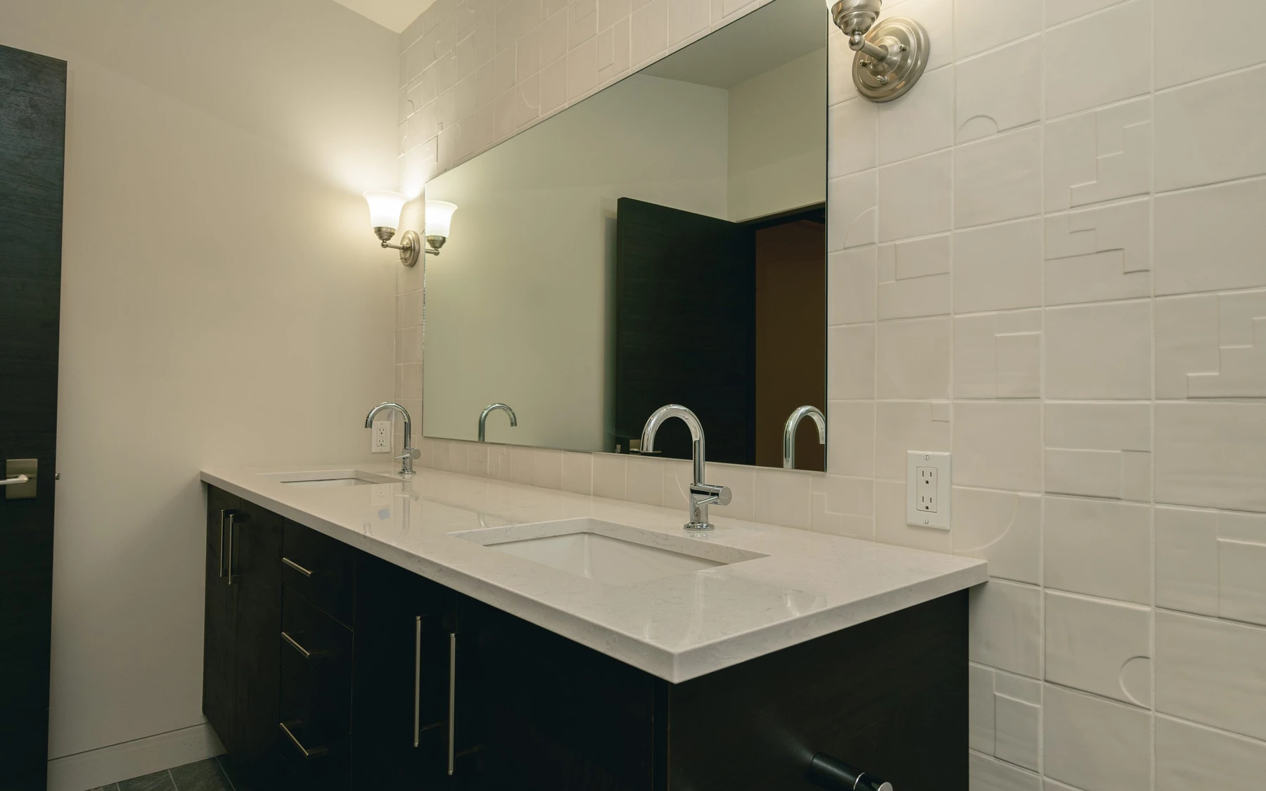 Bathroom in the Modern Elegance custom home near McCall, with a custom vanity and wood cabinetry.