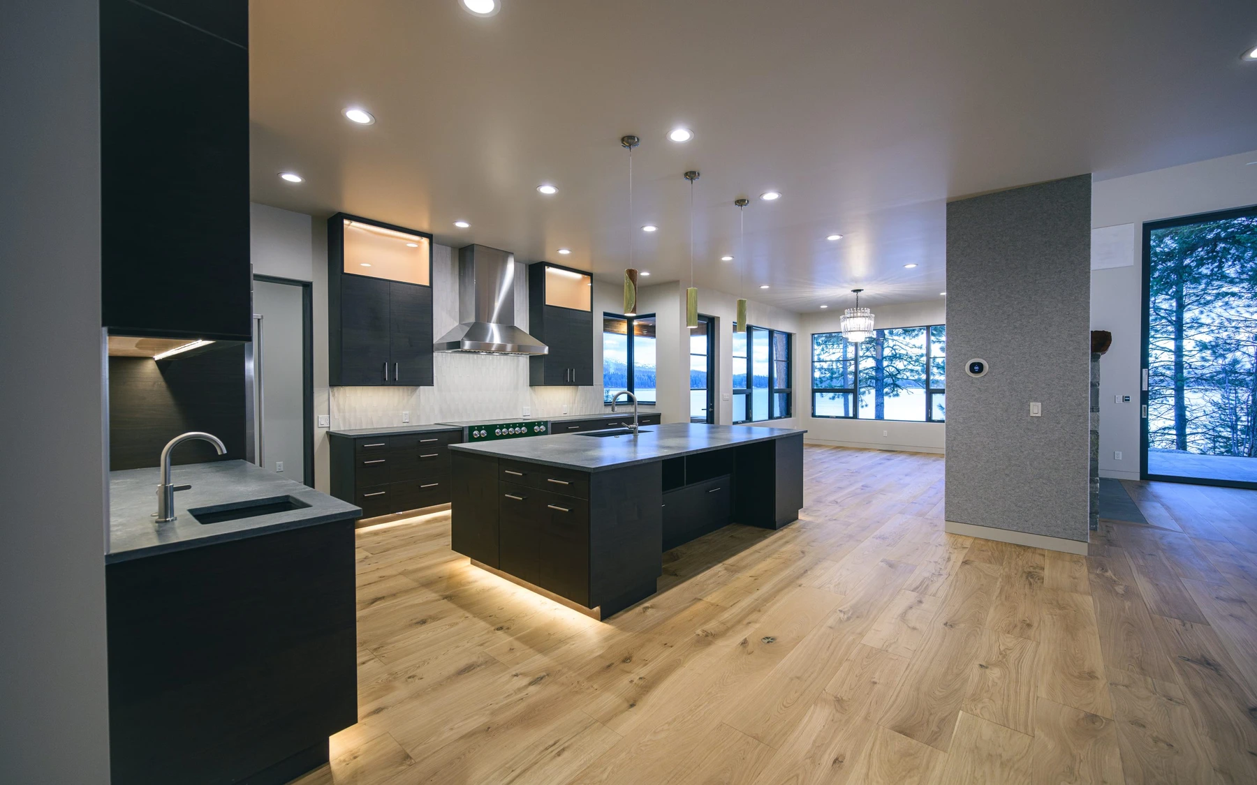 Interior detail in the Modern Elegance custom home near McCall, showing built-in cabinetry, large windows, and wood finishes.