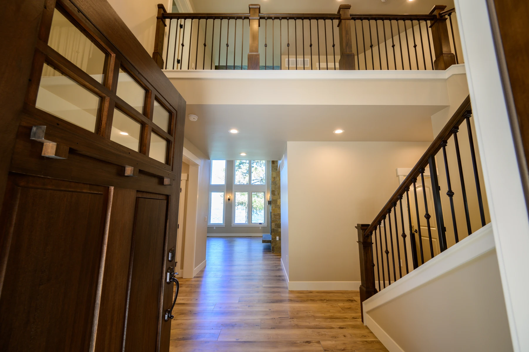 Entry hall looking toward the lake-facing great room and upper bridge