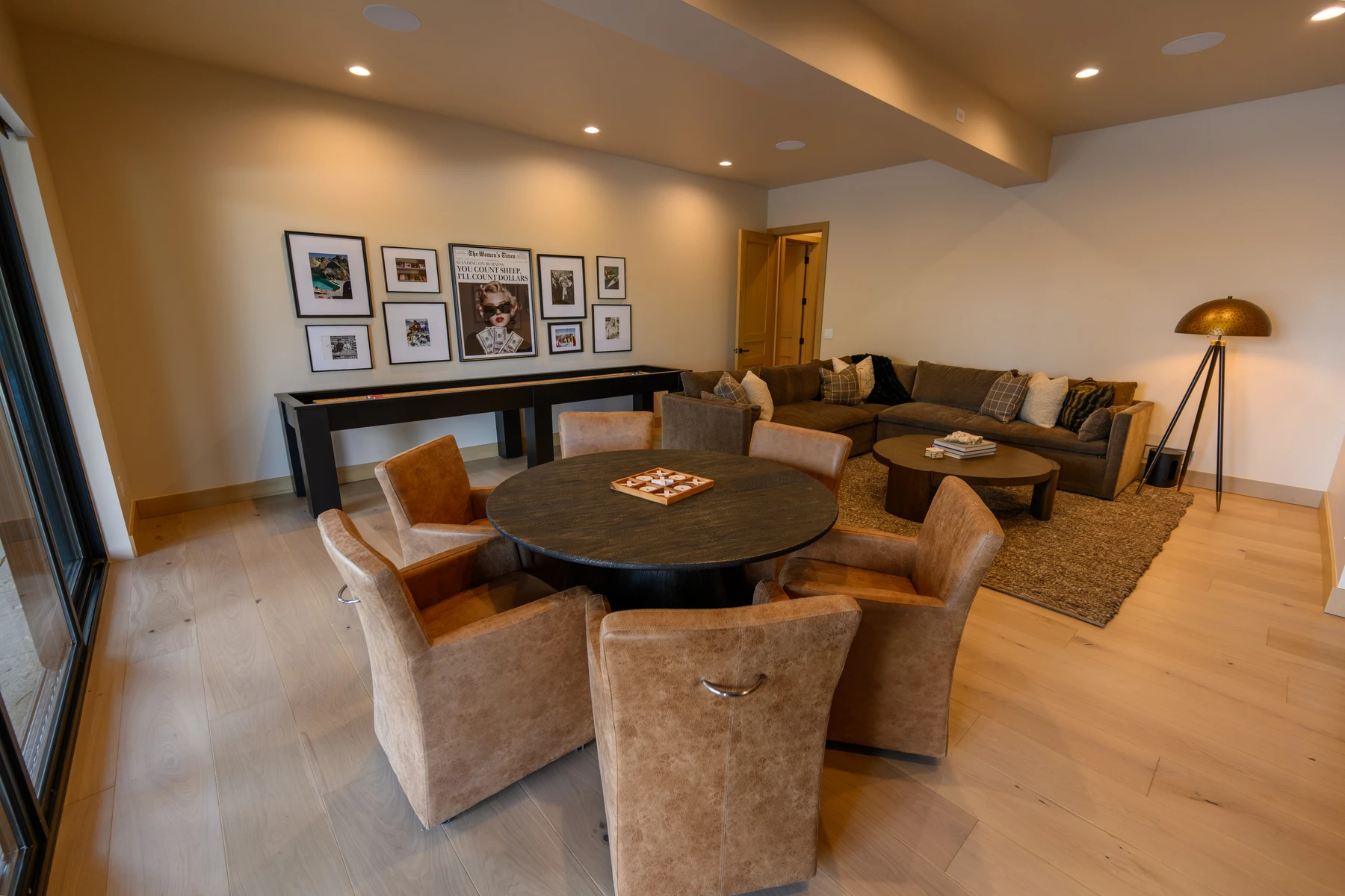 Living room in the SlopeSide Escape ski home at Tamarack Resort, with a relaxed seating area and warm wood finishes.