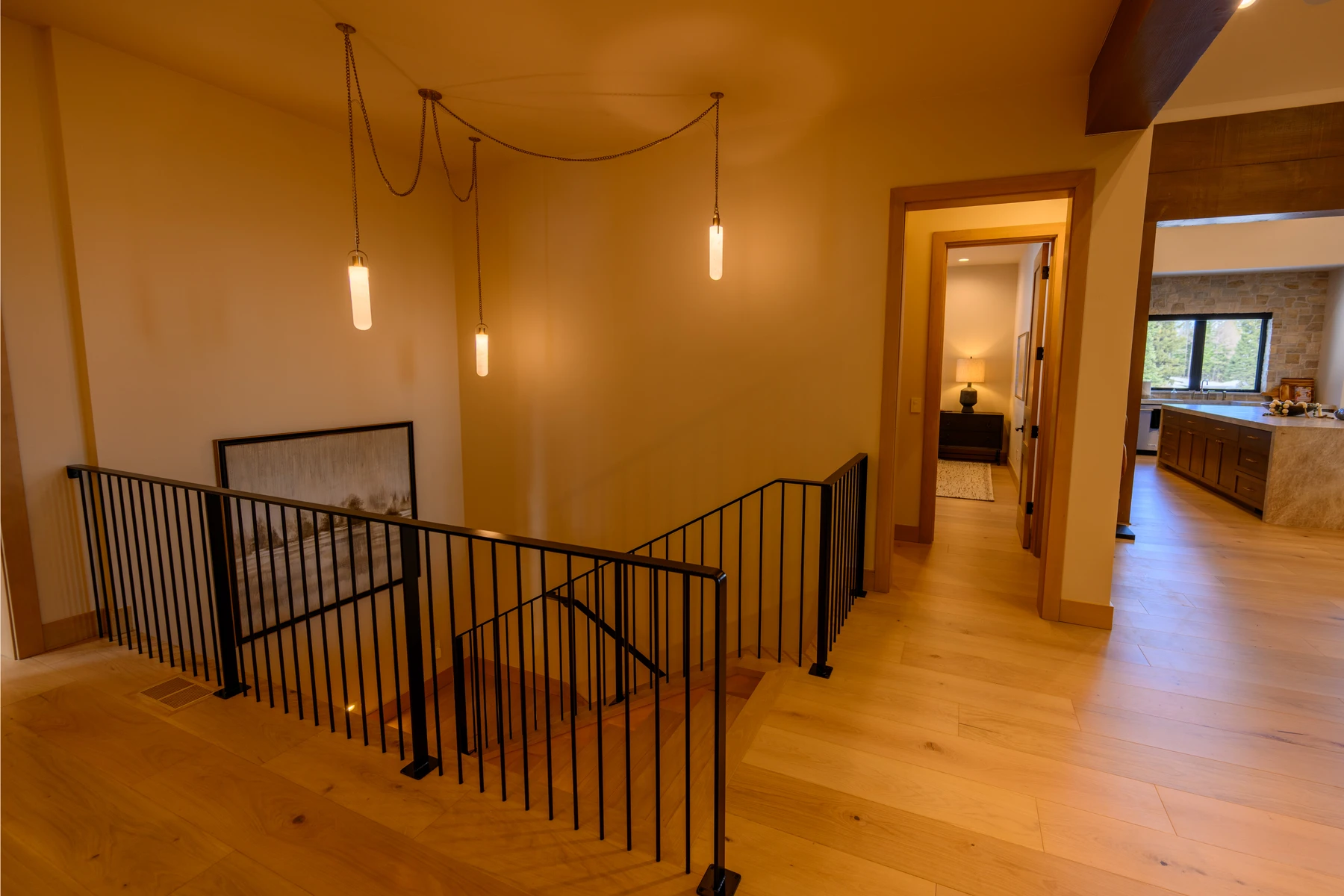 Interior detail in the SlopeSide Escape ski home at Tamarack Resort, showing large windows and wood finishes.