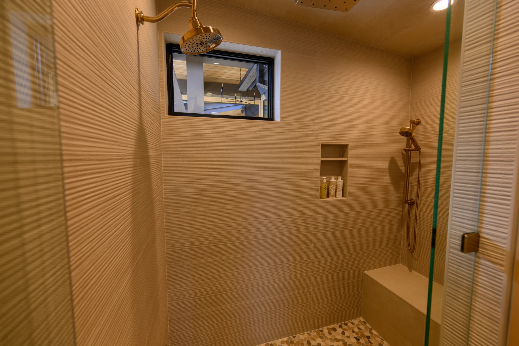Bathroom in the SlopeSide Escape ski home at Tamarack Resort, with a glass shower.