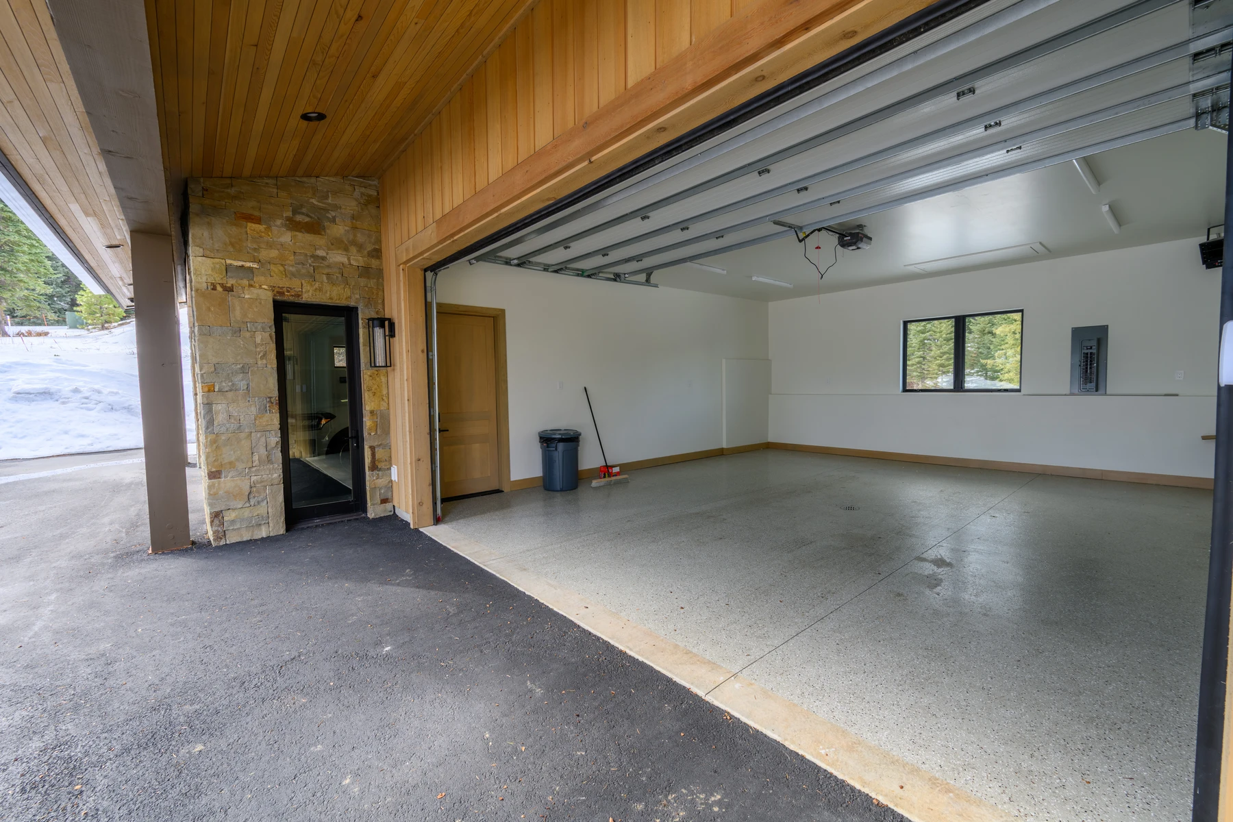 Garage approach at the SlopeSide Escape ski home at Tamarack Resort, with an attached garage.
