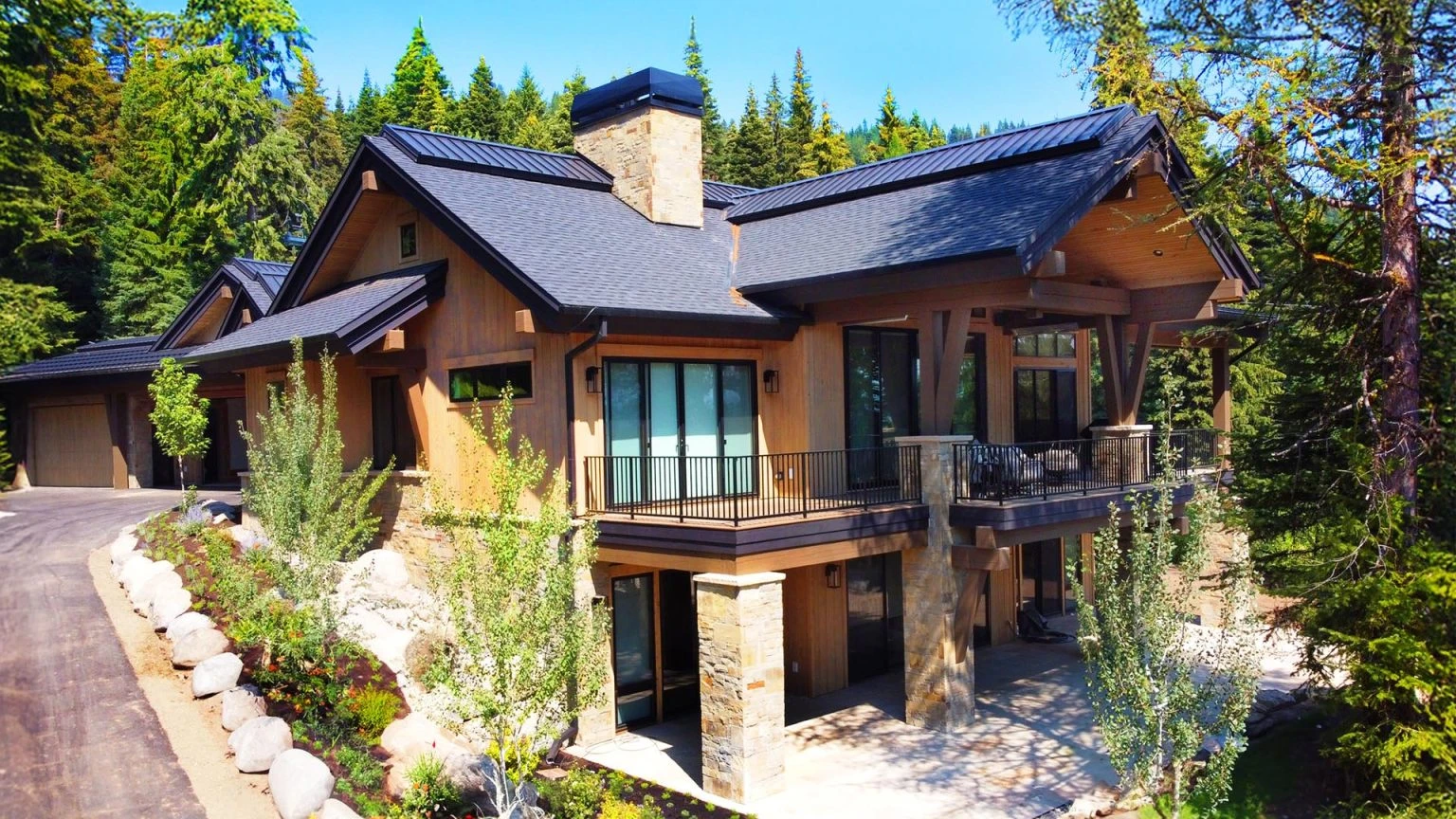SlopeSide Escape: front entry with stone base and cedar gable